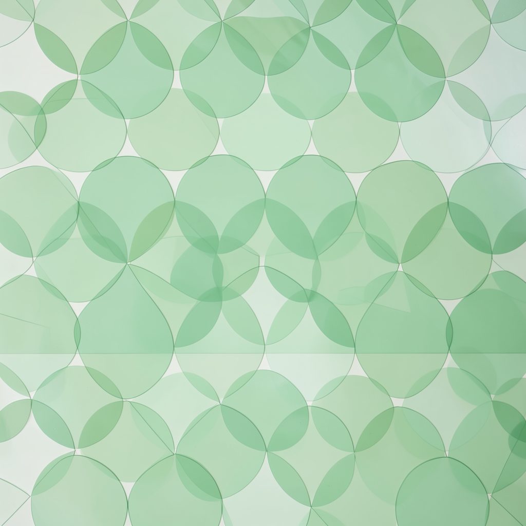 Abstract geometric pattern of overlapping translucent circles in soft green tones, suggesting data nodes and semantic connections
